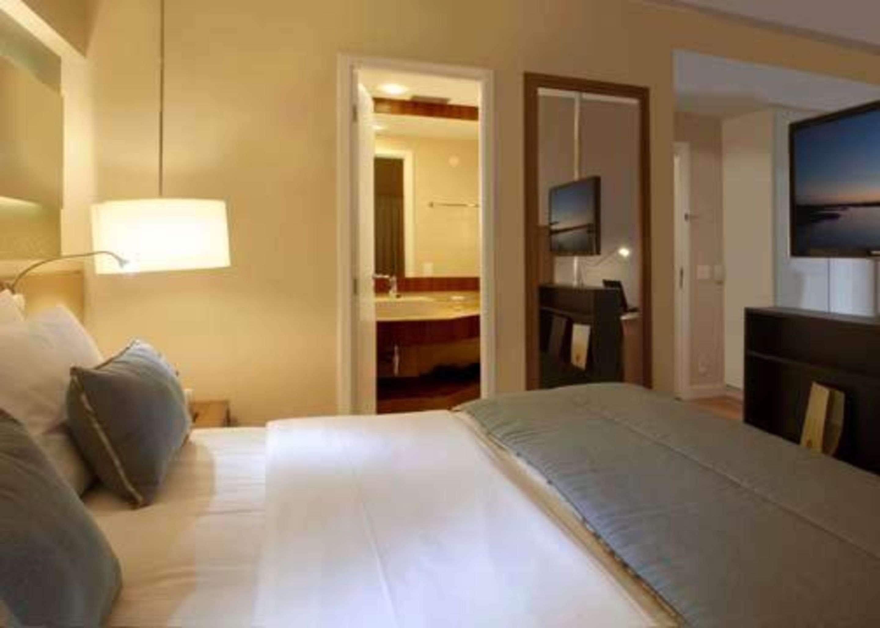 Hotel Clarion Faria Lima São Paulo Exterior foto A bedroom at the hotel
